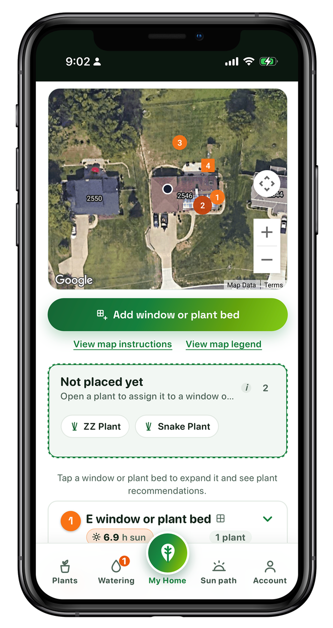 Plant Compass Pro on iPhone showing your home from overhead on satellite, with direct-sun hours rated at each window